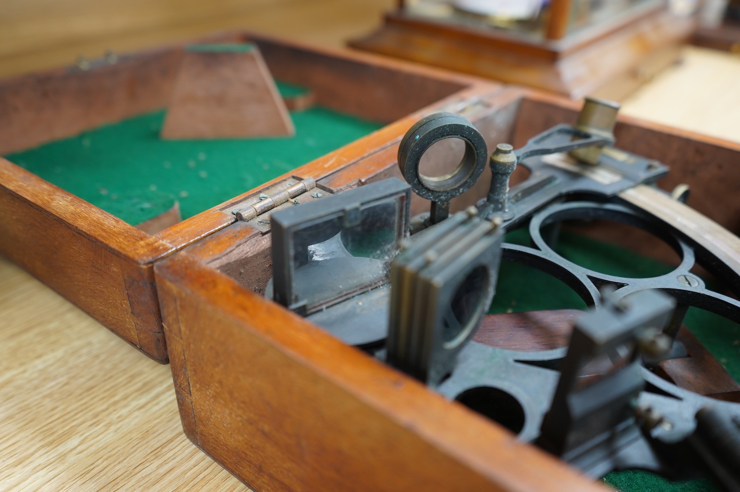 An early 20th century mahogany cased brass sextant by H.G. Blair & Co., 53 James St., Cardiff. Condition - fair to good, some general wear and tarnishing to the brass work. It would benefit from cleaning.